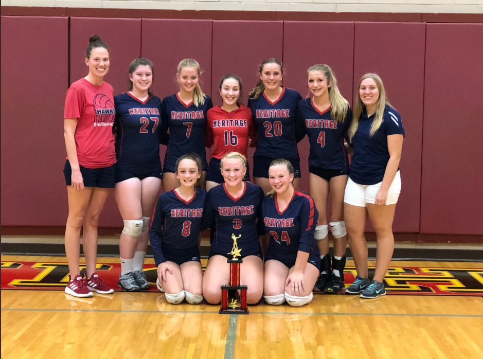 Buesing wins medalist honors, Hawks volleyball rallies for win